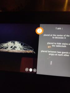 Image of computer screen with table centerpiece and three answer options about what it is. 